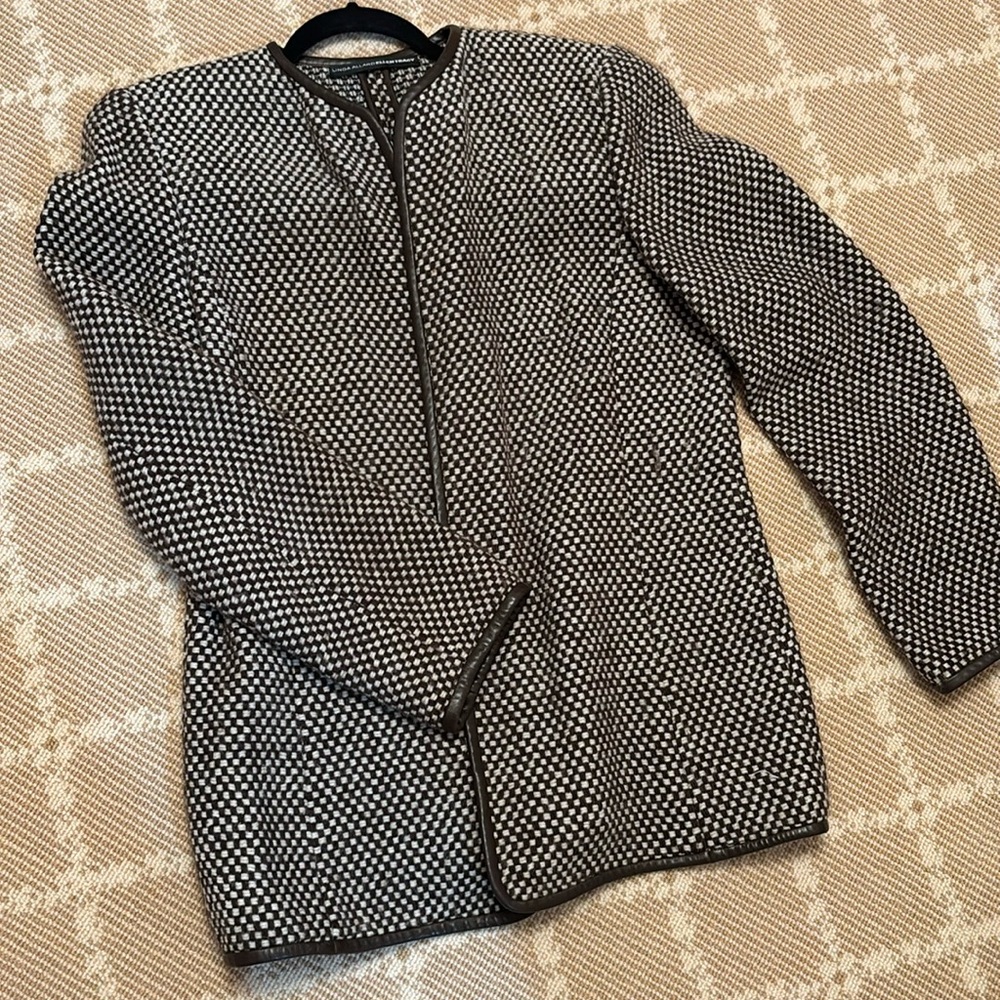 Fingertip length jacket can be dressed up or down